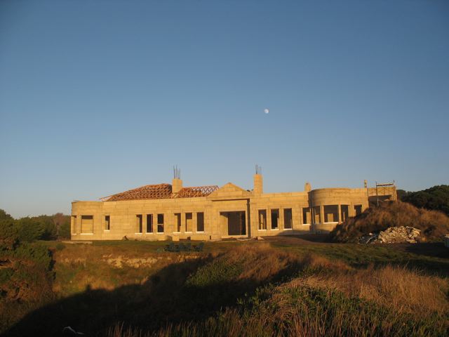 view from the coast of the Colbert DAC-ART custom coastal stone home